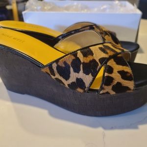 Nine West "More to Lover" real fur platform wedges
